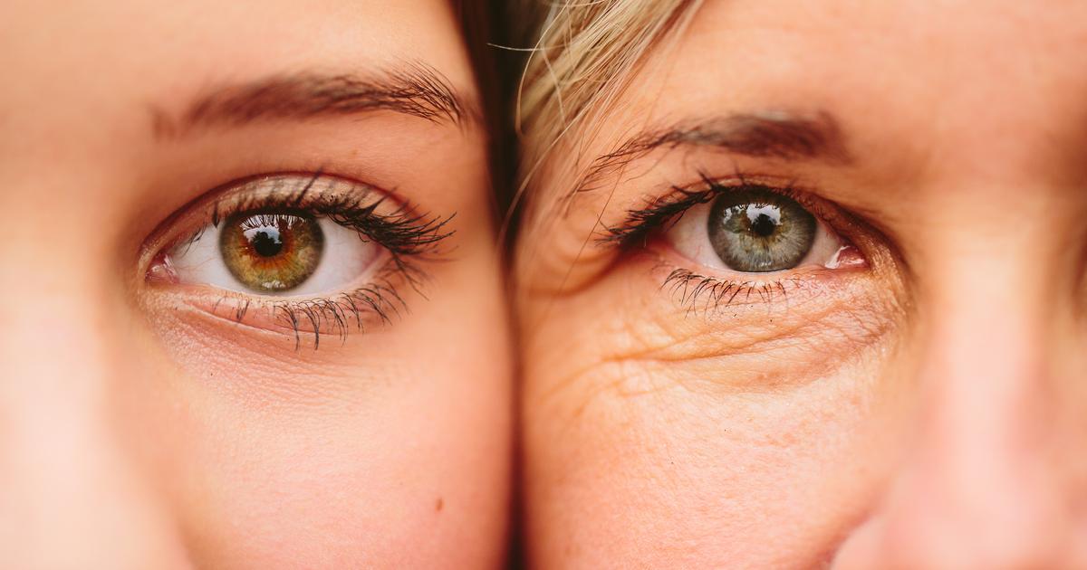 Close Up Of Mother And Daughter Faces Together