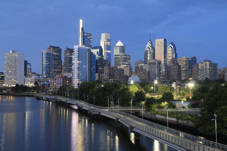 Philadelphia skyline reflected on Schuylkill River at dusk, Pennsylvania, USA