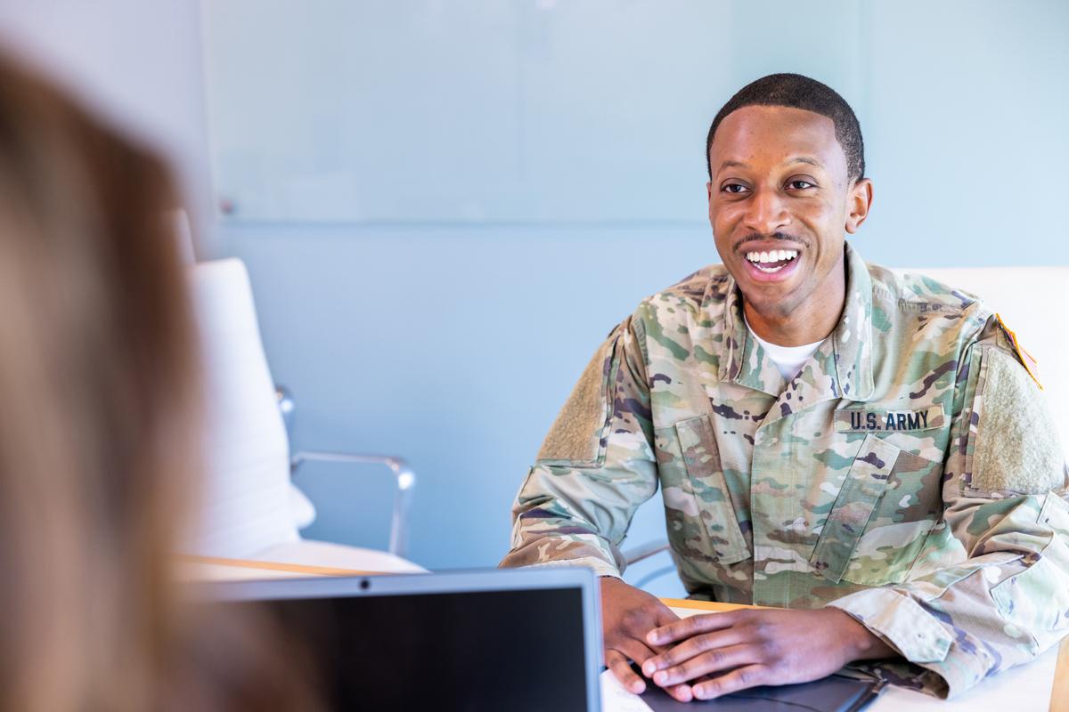 Banker meeting with African American military service member