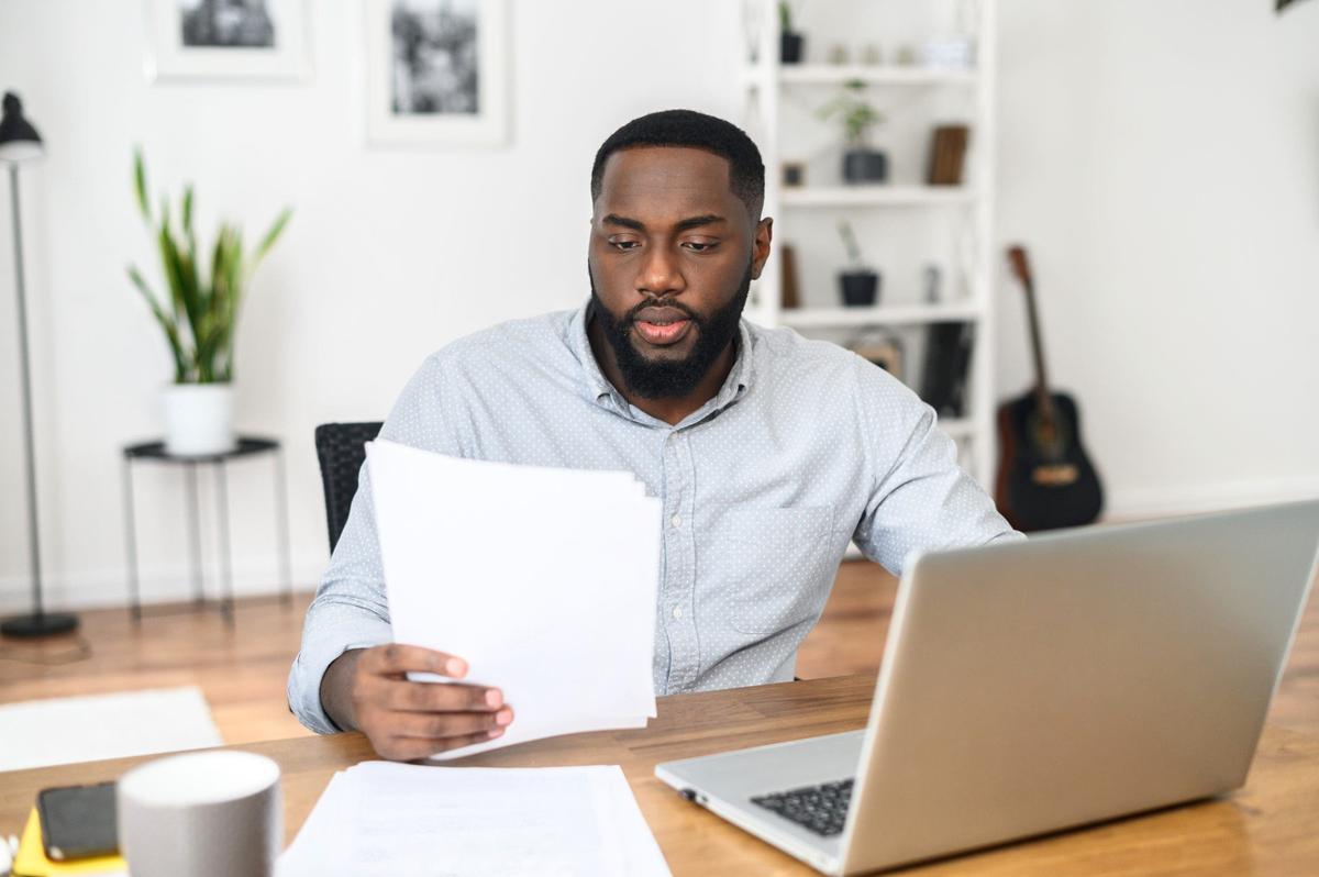 African American entrepreneur reading the contract